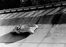 Image: Mercedes-Benz W 196 R (1954) - Stirling Moss on the occasion of the Italian Grand Prix in Monza on September 11, 1955 in the banked curve