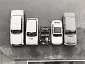 Bild: Minima (1973) - das Chassis der Entwicklung von Victor Bouffort und Henri Viard zwischen grösseren Verkehrsteilnehmern