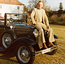 Image: Moments from the life of Fritz B. Busch: Posing on the Ford A model