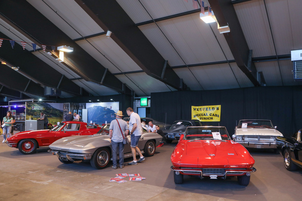 Neidfeld's Special Cars shows this beautiful red Chevrolet Corvette C2 from 1966, for sale for CHF 79,900 - Swiss Classic World Lucerne 2023