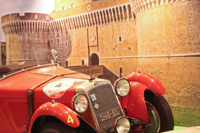 OM racing cars in front of an impressive backdrop - Auto e Moto d'Epoca Padova 2015