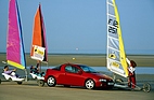 Bild: Opel Tigra (1995) – bringt frischen Wind auf die Strasse (oder an den Strand)