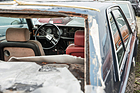 Park- oder Schrottplatz Kirchberg 2024 - Blick auf das weitgehend noch vollständige Cockpit eines Fiat 130 Coupés
