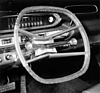 Plymouth Fury (1960) – oben und unten abgeflachtes "Aero Wheel" mit transparenten Segmenten im Kranz. Interessant: Tacho mit km/h-Skalierung