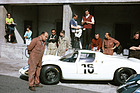 Image: Porsche 910 (1967) - 1967 in Monza. In front of the car is racing mechanic Willi Enz, to his right Egon Alber, behind the 910 with red sweater racing engineer Valentin Schäffer, on the far right Paul Hensler.