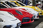 Image: Porsche 911s from the 992 generation lined up at the Icon Cars booth – Classic Expo 2026