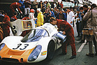Image: Porsche Type 908 LH Coupé (1968) - Le Mans 1968 - Rolf Stommelen (with red helmet) refueling the Porsche Type 908 LH Coupé, with Ferdinand Piëch to his right