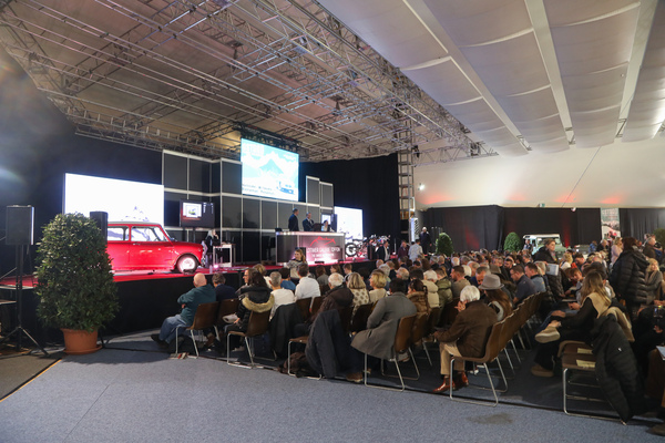 Virtually all seats occupied in the festival tent - "Gstaad Classic Car Auction" of the Oldtimer Galerie Toffen on December 29, 2023