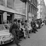Renault 8 Gordini (1968) — the French ski team on the Champs-Élysées in Paris