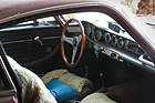 Scheunenfund Volvo P1800 S (1968) - Blick ins Interieur, die Felle sind typisch für die damalige Zeit, das Leder darunter ist ausgetrocknet