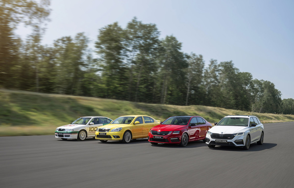 Image: Škoda Octavia RS (2020) — Four generations of the RS in formation — with the race car in the “100 Years of Motorsport” livery leading the way