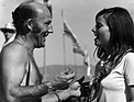 Image: Stirling Moss and Linda Weldon Feldhorn at Riverside Raceway 1965