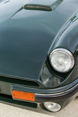 TVR S3C (1992) – runde, chromgefasste Scheinwerfer als Sechzigerajhre-Reminiszenz, Fernstrahler in der Frontschürze