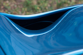 TVR Tuscan S Mk 2 (2005) - unter den vorderen Wölbungen befindet sich sind die Lüfter für den Motor