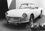 Triumph Spitfire 4 (1962) - auf einem Autosalon (© Archiv Automobil Revue) Triumph Spitfire 4 (1962) - auf einem Autosalon (© Archiv Automobil Revue)