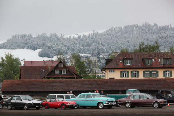 Image: Unusual snowy backdrop - classic car Sunday morning train meeting on May 5, 2019