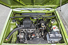 VW Golf LS (1976) - quer und geneigt eingebauter 1,6-Liter-Vierzylindermotor mit darangeflanschtem Getriebe
