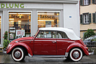 Image: VW Kàfer Cabriolet (1965) - "lesen lassen" is written on the shop window - O-iO 2016