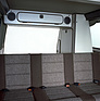 Image: VW T3 (1985) - Built-in cupboards were available as an option for the Multivan. In combination with the optional pop-top roof, this turned it into a camper.
