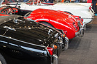 Zunehmende Düsenjäger-Auswüchse: vorne Triumph TR3, dahinter MGA 1600 und Chevrolet Corvette – Bremen Classic Motorshow 2024