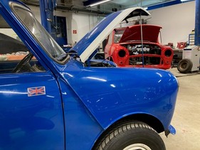 Two Mini in the Kompass garage