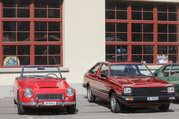 Image: Two Datsuns - on the left a Datsun 1600 Sports (from 1968), on the right a Cherry - 15 years in between - Older Classics August 2023