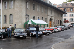 classic cars are lined up everywhere at the British Car Meeting in Morges