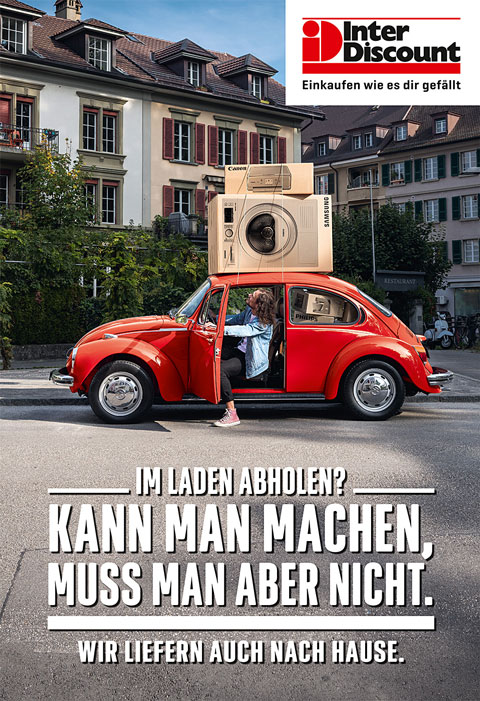 Werbeplakat Interdiscount mit VW Käfer (© Interdiscount)